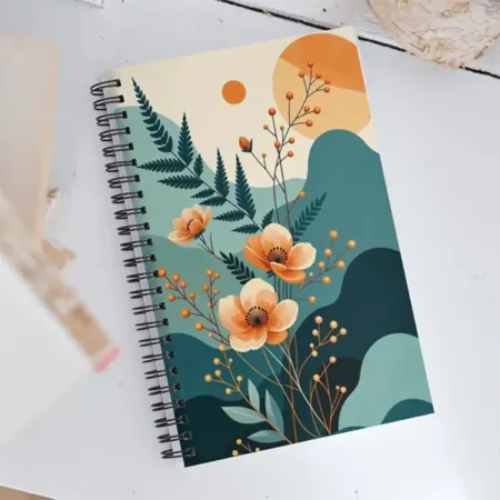 A spiral-bound notebook with a colorful, bohemian-style floral